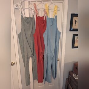 Bundle of Three Jumpsuits in Sage Green, Rust, and Light Blue